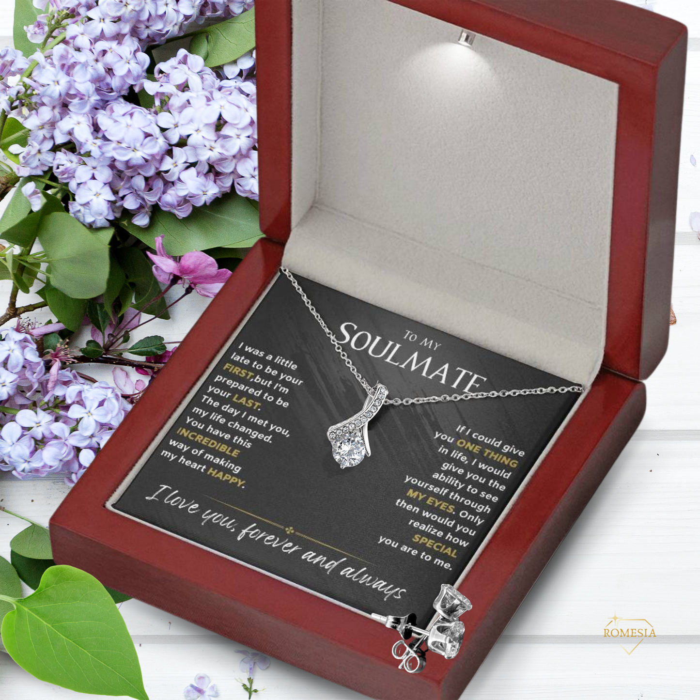Celebrate love with the dazzling Alluring Necklace, featuring CZ stones and a ribbon pendant — a timeless gift for her to cherish.